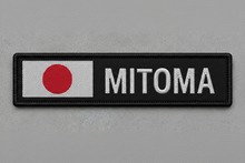 Load image into Gallery viewer, Custom flag name patch, angled view showing embroidery detail